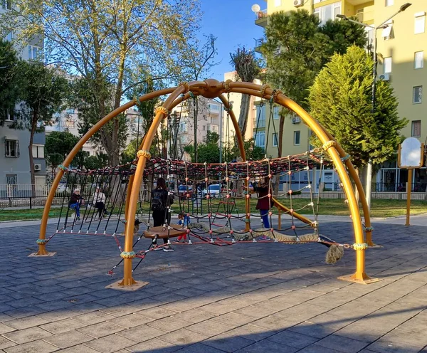 Outdoor Playground Climbing Area Two Old Men Sitting Bench Children — Stock Photo, Image