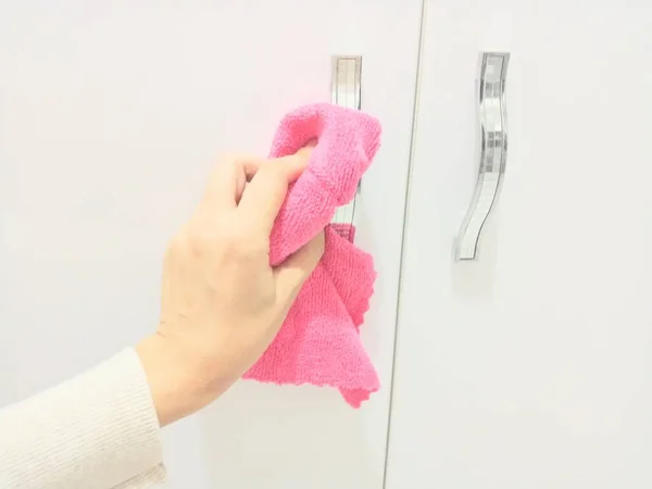 Cabinet Handles Cleaned Pink Cloth Woman Wiping —  Fotos de Stock