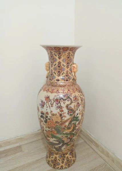 Chinese vase with a dragon pattern. Made in China. Ceramic vase.