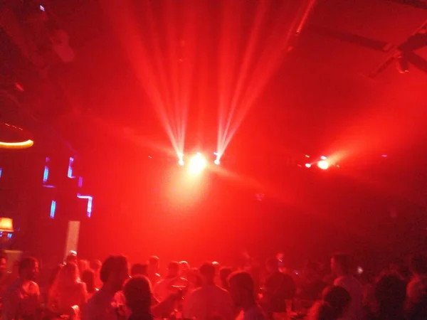 Night club under red spot light. Amazing red colour.