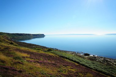 Beautiful view of the Irish Sea, seen from the clifftop path immediately south of Whitehaven, on England's Cumbrian coast. The Isle of Man can clearly be seen on the horizon.