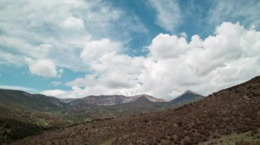 Pyramid Peak and the Snake Mountain Range, located within Great Basin National Park in Nevada. A time-lapse of clouds passing overhead on a summer day, as seen from the Serviceberry Trail