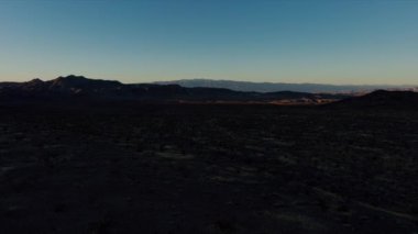 A sunrise time-lapse of the abandoned Noonday Mine near the South Nopah Range Wilderness in Tecopa, CA. The Avawatz mountain range is seen in the background