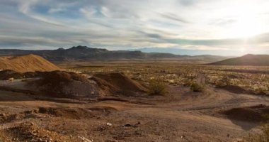 A sunset time-lapse of the abandoned Noonday Mine near the South Nopah Range Wilderness in Tecopa, CA. The Avawatz mountain range is seen in the background