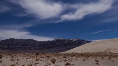 A night-to-day time lapse of  the Eureka Dunes in Death Valley National Park, California
