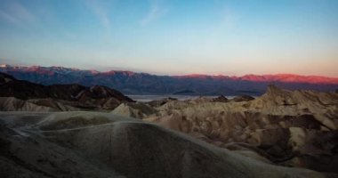A time lapse of the morning sun illuminating the Panamint Range and Zabriskie Point in Death Valley National Park, California
