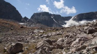 A time-lapse of clouds passing through a blue sky, just north of Douglas Pass in Wyoming's Wind River Range
