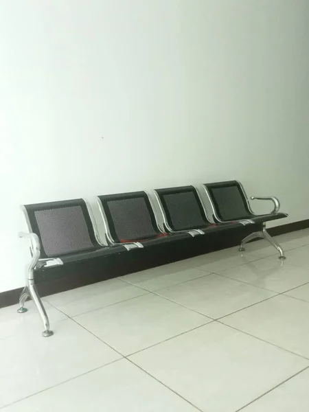 waiting room prepared for hospital patients with rows of empty seats