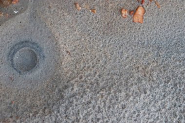 White sand with a pattern formed by rain drops