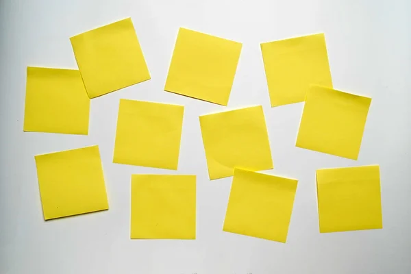 Blank Sticker notes on the white background. Mockup sticky Note Paper. empty sheets for notes on a white bulletin board
