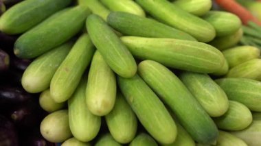 Fresh cucumbers in traditional market. Top view of cucumber