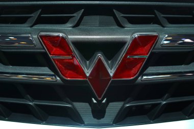 Tangerang, Indonesia - August 11, 2022: A logo of Wuling brand attached on a car's front.