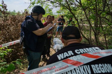 Mala Rogan, Kharkiv Oblast, Ukraine. August 11, 2022. Exhumation of a local man killed by Russian occupants. 