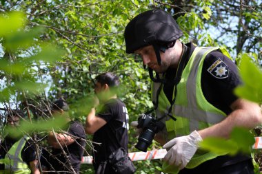 Mala Rogan, Kharkiv Oblast, Ukraine. August 11, 2022. Exhumation of a local man killed by Russian occupants. 