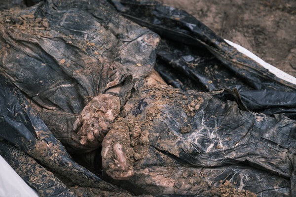 Izyum, Kharkiv Oblast, Ukraine. September 17, 2022. Exhumation of 450 bodies from a mass grave. Most of the victims were tortured and killed during Russian occupation. There were children among them.