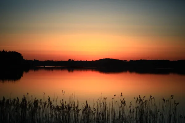 Gün batımı Fryland Gölü üzerinde, Zaman, Norveç