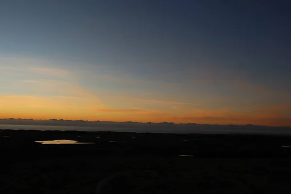 Güneşsiz ve bulutsuz gün batımı