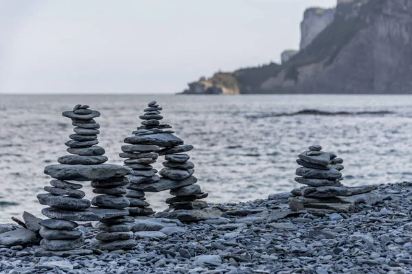 Stone cairns on the coast of Saint Lawrence Gulf (Canada, Quebec)