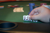 Poker hand pocket queens at the texas holdem table
