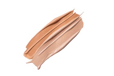 Sıvı fondöten lekeleri beyaz arka planda izole edilmiş. Tasarımınız için açık ve koyu bej sıvı temel.