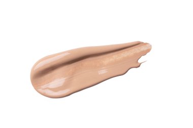 Sıvı fondöten lekesi beyaz arkaplanda izole edilmiş. Tasarımınız için bej rengi sıvı temel.