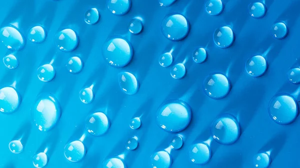 Gotas Agua Sobre Fondo Azul Gotas Abstractas Gel Cosméticos Suero —  Fotos de Stock