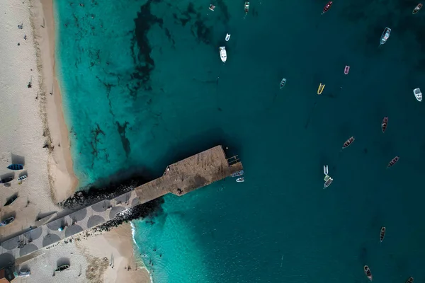 Pier overlooking the atlantic ocean, top view, drone view