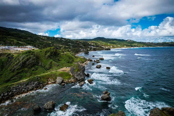 Stone Coastline Island Barbados Overlooking Emerald Mountains Stock Picture