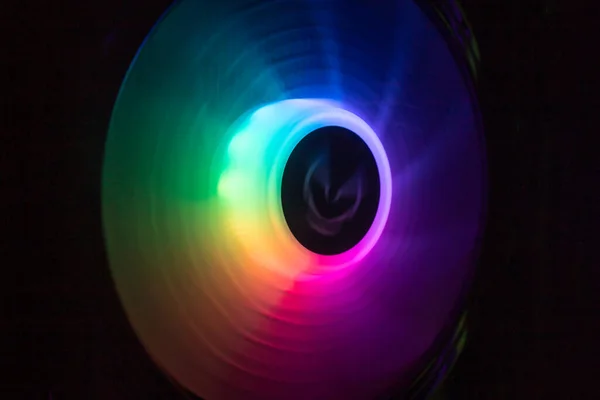 luminous circle with multiple colors like a rainbow on a black background