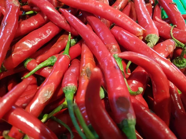 Red pepper. Red hot chilli peppers pattern texture background. Close up. A backdrop of Red hot chilli peppers. selective focus chilli