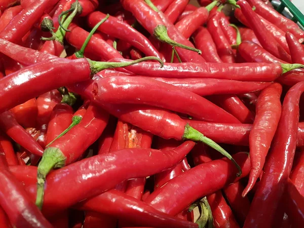 Red pepper. Red hot chilli peppers pattern texture background. Close up. A backdrop of Red hot chilli peppers. selective focus chilli