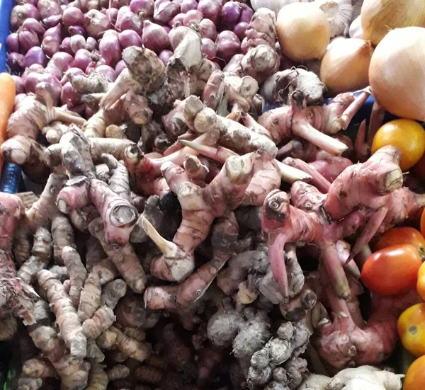 stock image heap of ginger root background, . Lots of ginger root. Harvest ginger. Ginger root is food background. Close-up.