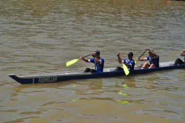 Banjarmasin, South Klimantan, Indonesia - August 7, 2022 : Floating Market Cultural Festival. The B6 jukung competition is a jukung rowing competition consisting of 6 rowers