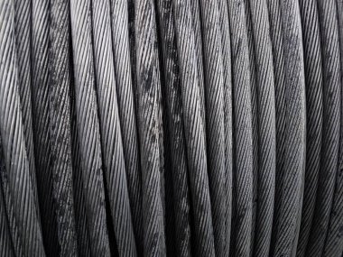 Power Aluminum Conductor on wooden table and Used in the construction of large power plants,Selective focus.Electric power aluminum conductor,Wire of electrical power cable.