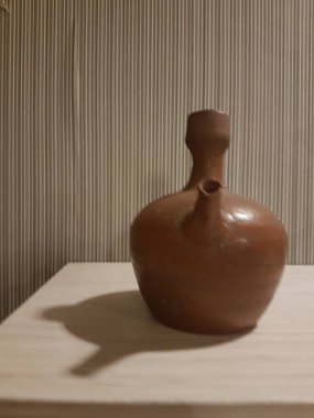 Eartheware bowls, or in Indonesia known as gerabah, typical handmade craft from Banyumulek village, Lombok Island, Indonesia. Unique bowl. Selective focus.