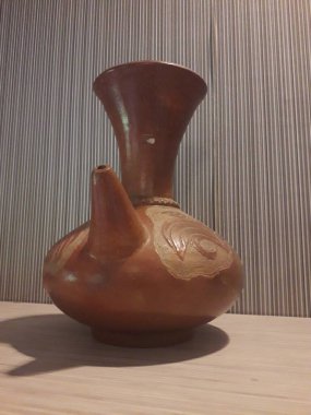 Eartheware bowls, or in Indonesia known as gerabah, typical handmade craft from Banyumulek village, Lombok Island, Indonesia. Unique bowl. Selective focus.