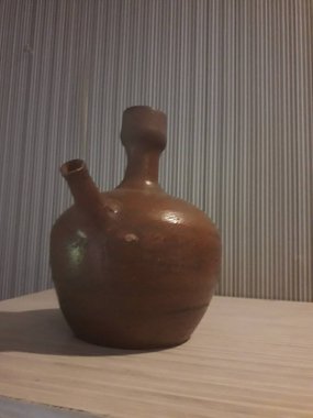 Eartheware bowls, or in Indonesia known as gerabah, typical handmade craft from Banyumulek village, Lombok Island, Indonesia. Unique bowl. Selective focus.