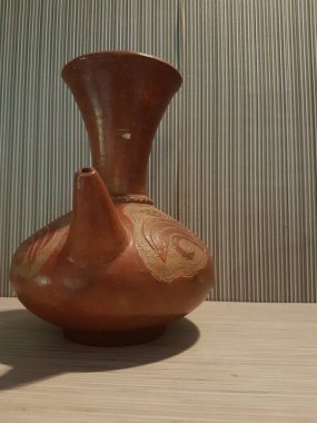 Eartheware bowls, or in Indonesia known as gerabah, typical handmade craft from Banyumulek village, Lombok Island, Indonesia. Unique bowl. Selective focus.