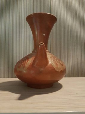 Eartheware bowls, or in Indonesia known as gerabah, typical handmade craft from Banyumulek village, Lombok Island, Indonesia. Unique bowl. Selective focus.