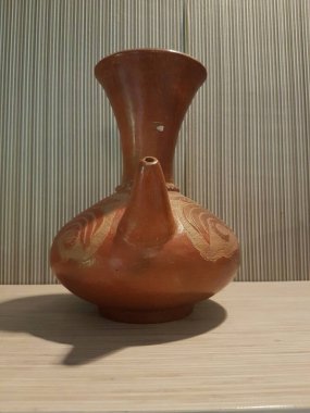 Eartheware bowls, or in Indonesia known as gerabah, typical handmade craft from Banyumulek village, Lombok Island, Indonesia. Unique bowl. Selective focus.