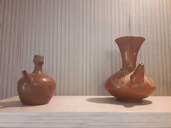 Eartheware bowls, or in Indonesia known as gerabah, typical handmade craft from Banyumulek village, Lombok Island, Indonesia. Unique bowl. Selective focus.