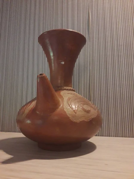 Eartheware bowls, or in Indonesia known as gerabah, typical handmade craft from Banyumulek village, Lombok Island, Indonesia. Unique bowl. Selective focus.