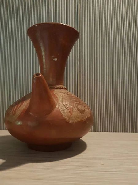 Eartheware bowls, or in Indonesia known as gerabah, typical handmade craft from Banyumulek village, Lombok Island, Indonesia. Unique bowl. Selective focus.