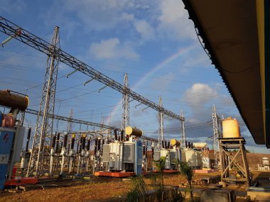 rainbow and bright blue sky at the substation