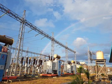 rainbow and bright blue sky at the substation
