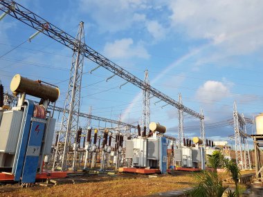 rainbow and bright blue sky at the substation