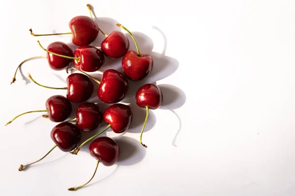 Cherries Shoots Have Hard Shadows Placed Bunch Light Background — Stock Photo, Image