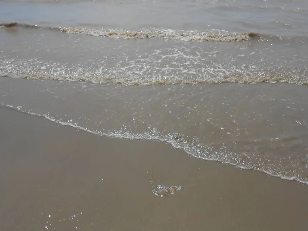 View of small waves in Meschers-sur-Gironde beach.
