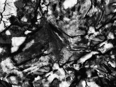 defocused grunge black white cement abstract background with relief