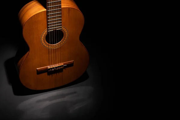 Classical Guitar Body Close Dramatically Lit Black Background Copy Space — 스톡 사진